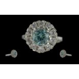 Ladies attractive 9ct white gold aquamarine and diamond set cluster ring, marked 9ct to shank. the