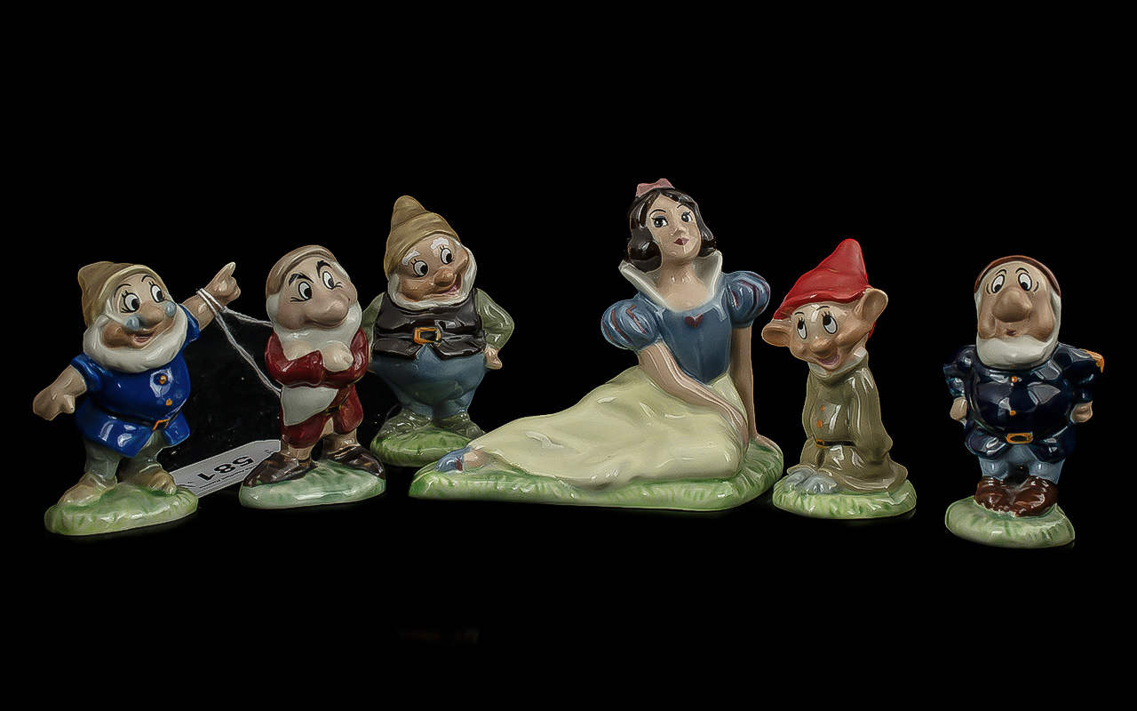 Wade Walt Disney Productions, Snow White and Seven Dwarfs, all in good condition.