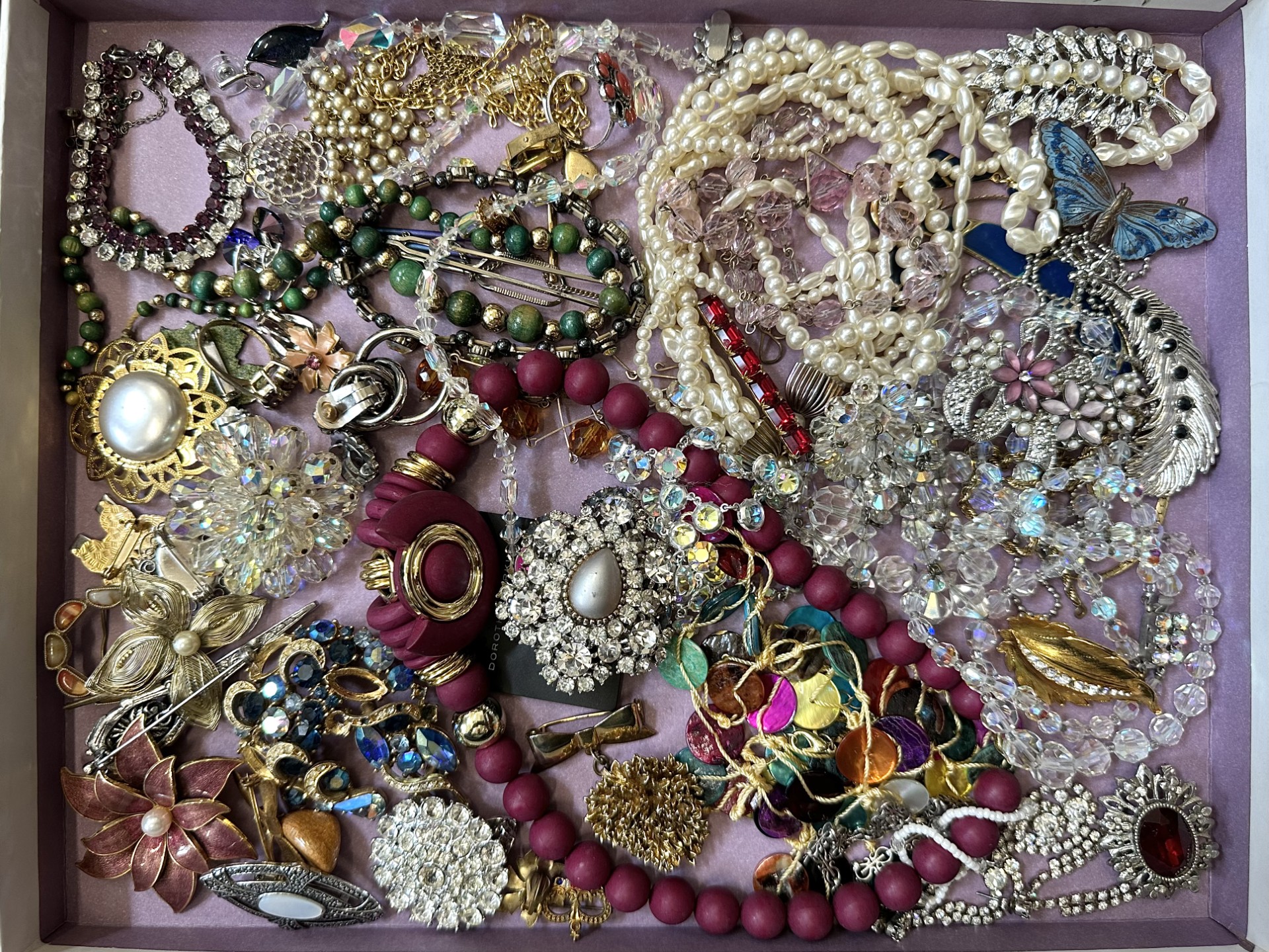 Collection of Costume Jewellery, comprising bracelets, brooches, necklaces, beads, earrings, etc.