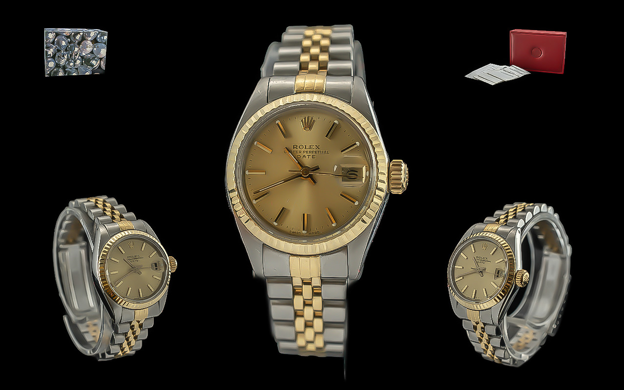 Rolex - ladies oyster perpetual date 18ct gold and steel wrist watch, with champagne dial, gold