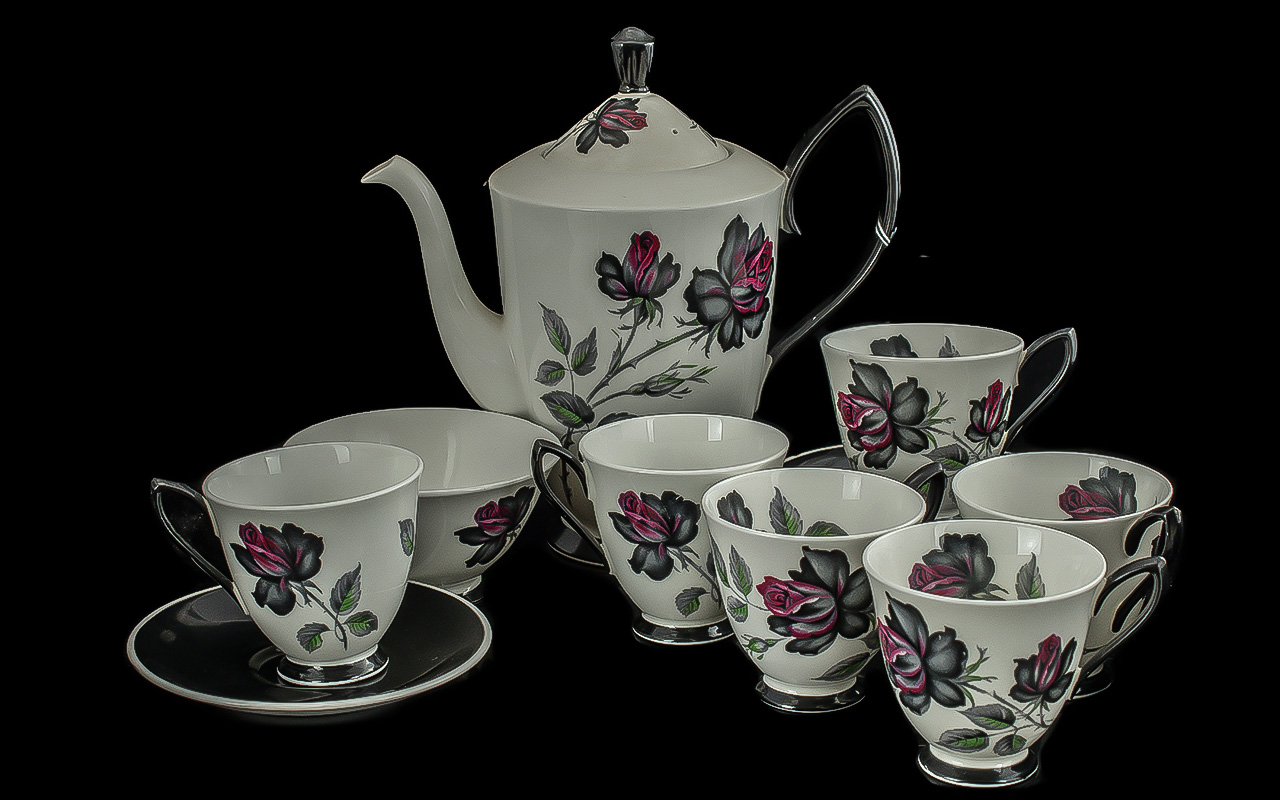 Royal Albert 'Masquerade' Tea Set, comprising teapot, six cups and saucers, and sugar bowl.