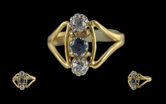 18ct gold - pleasing 3 stone diamond and sapphire set ring of pleasing design. marked 18ct to