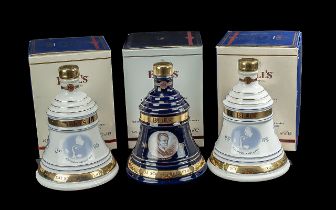 Three Bottles of Bells Old Scotch Whisky Christmas Decanters, full contents, 8 years old, in