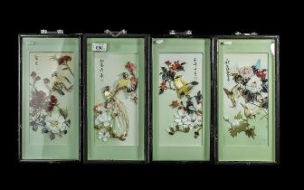 Four Oriental Shell Pictures, depicting tropical birds, trees, and flowers, all mounted, framed