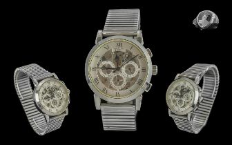 Rotary Automatic Skeleton Dial Watch with day, date and 24 hour display, complete with electric