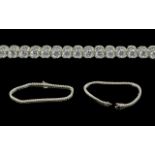 Ladies - Fine 18ct White Gold Diamond Set Tennis Bracelet, marked 750 - 18ct, the well matched