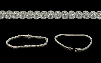 Ladies - Fine 18ct White Gold Diamond Set Tennis Bracelet, marked 750 - 18ct, the well matched