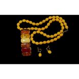 Set of Butterscotch Amber Style Coloured Beads, together with a matching pair of earrings and an