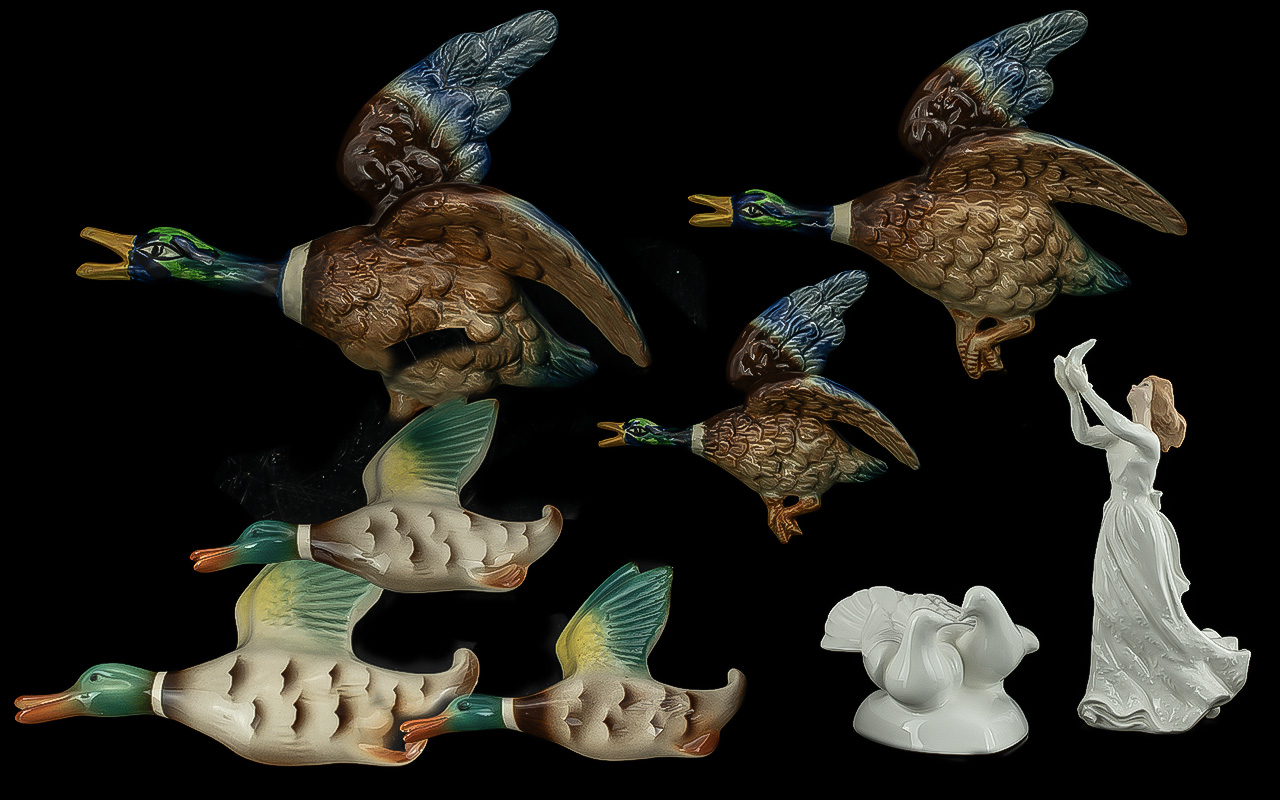 Two Sets of Flying Birds, one Falcon Ware Ducks No 1402 a set of three graduated mallard duck wall
