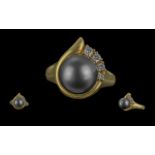 Ladies Pleasing Quality 18ct Gold Black Pearl and Diamond Set Ring, marked 750 - 18ct to interior of