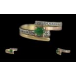 Ladies 14ct Gold Emerald and Diamond Set Ring. Marked 14ct to Interior of Shank. Set with 26 Well