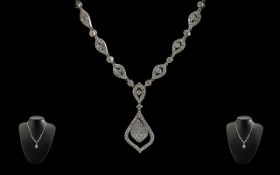 Ladies - Excellent quality and elegant 18ct White Gold Diamond set Necklace with drop, marked