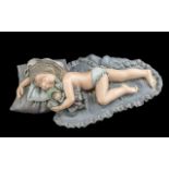 Elisa Figure of a Sleeping Child, in original box with booklet.