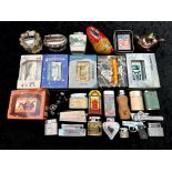 Collection of Vintage Novelty Lighters, including six boxed Oriental 'Smoking Set' novelty lighters,
