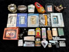 Collection of Vintage Novelty Lighters, including six boxed Oriental 'Smoking Set' novelty lighters,
