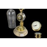 Two Vintage Clocks, comprising a pedestal mantle clock with an eagle pediment, black face with