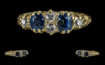 Late Edwardian Period - ladies 18ct gold 5 stone sapphire and diamond set ring, raised claw setting,