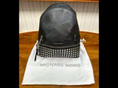 Michael Kors Interest. Ladies Michael Kors Black Leather Silver Studded Back Pack. Comes with its