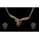 Ladies 14ct gold - pleasing quality diamond and ruby set necklace. marked 585 - 14ct. excellent