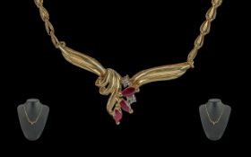 Ladies 14ct gold - pleasing quality diamond and ruby set necklace. marked 585 - 14ct. excellent