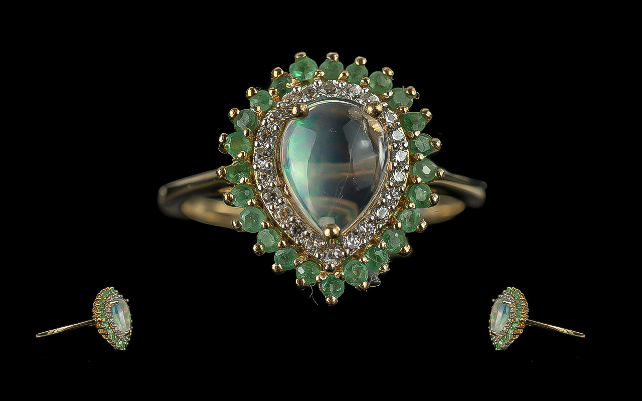 Emerald and Opal Cabochon Stylish Ring, size S/T. comprising a pear cut ...