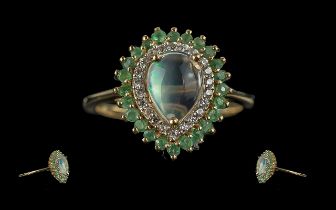 Emerald and Opal Cabochon Stylish Ring, size S/T. comprising a pear cut cabochon jelly opal,