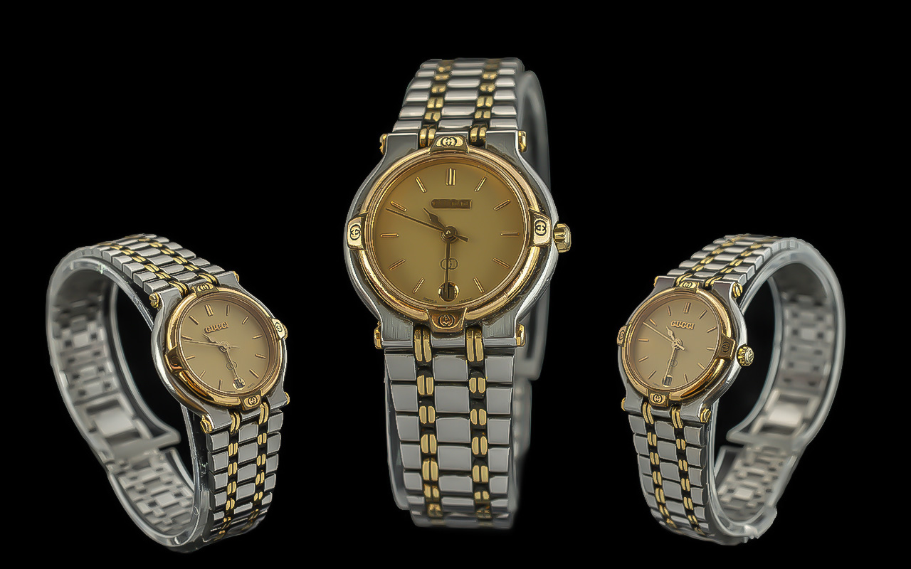 Gucci ladies steel and gold tone quartz wrist watch. good condition and working at time of