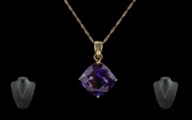 18ct gold excellent quality single stone amethyst set pendant drop. marked 18ct. the large faceted