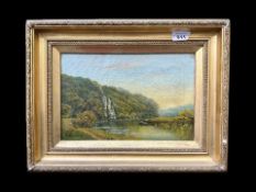 Oil on Canvas, indistinct signature, lake scene with boat and figures. Framed in gilt swept frame.