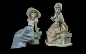 Nao by Lladro Pair of Hand Painted Porcelain Figures. Model Numbers 01042 & 1103. Heights of Figures