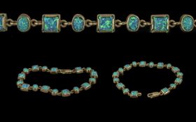 Ladies - pleasing 9ct gold opal set bracelet, marked 9.375, well matched blue / green opals,