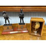 Military Interest A Presentation Clock housed in a wooden box. Together with a trophy of two armed