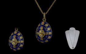 FA - Cadoro Signed 14ct Gold and Blue Enamel Egg Shaped Pendant of Exquisite Form and Quality.