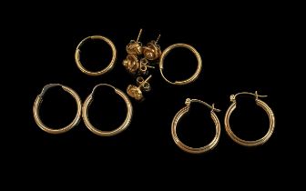 Five Pairs of Ladies Gold Earrings, three pairs of hoop earrings and two pairs of knot style