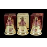 Three Bottles of Bells Old Scotch Whisky Christmas Decanters, full contents, 8 years old, in