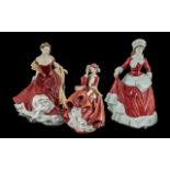 Three Royal Doulton Pretty Ladies comprising Winter Ball, Winter, and Top of the Hill. All in as new