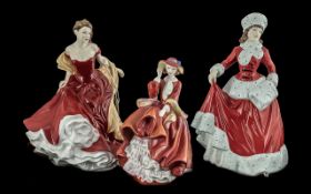 Three Royal Doulton Pretty Ladies comprising Winter Ball, Winter, and Top of the Hill. All in as new