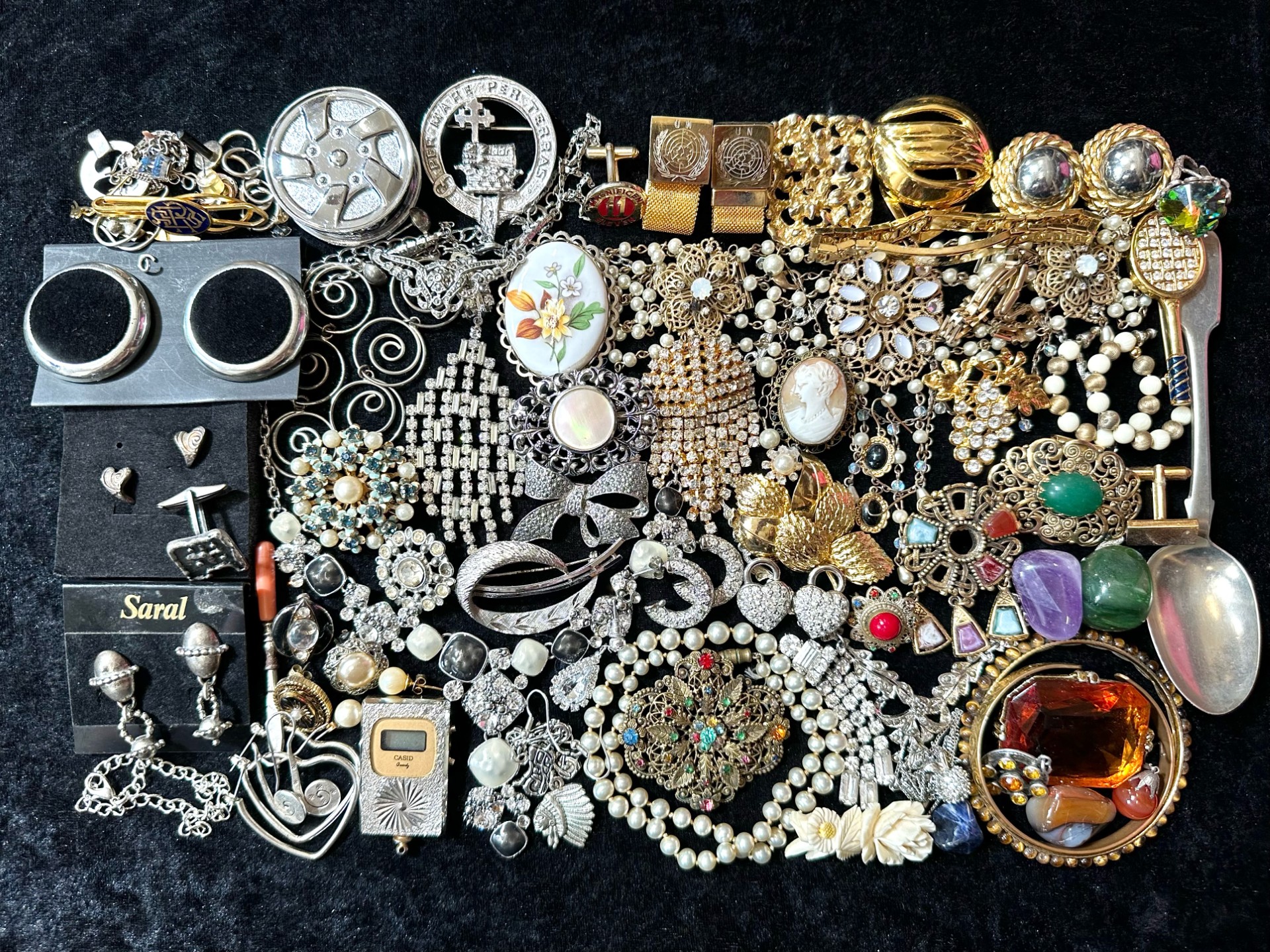 Collection Of Costume Jewellery - To Include Brooches, Earrings, Necklaces Stones, A Spoon Etc...