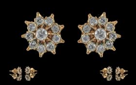 Ladies Pair of 14ct Gold Diamond Set Earrings, cluster design setting. Tests 14 ct. The round