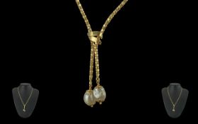 Al Mahmood Natural Pearls 18ct Gold Ornate Necklace with superb natural pearl tassel drop, marked