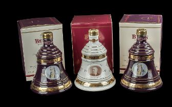 Two Bottles of Bells Old Scotch Whisky Christmas Decanters, full contents, 8 years old, in