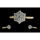 Ladies 18ct Gold Pleasing Diamond Set Cluster Ring, marked 18ct to interior of shank. Flowerhead