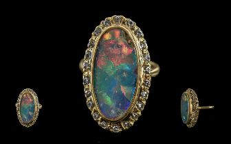 Ladies - Excellent 18ct Gold Diamond and Opal Set Ring, marked 18ct. the large elongated oval opal