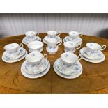 Royal Albert 'Blue Blossom' Tea Service, comprising nine cups, 8 saucers, 8 side plates, milk jug