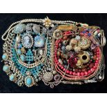 A Collection of Vintage Costume Jewellery to include necklaces, pearls, brooches, gold tone