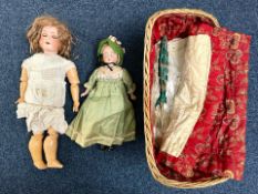 Antique German Bisque Doll, moving limbs, glass eyes and painted lips showing teeth, in need of