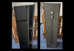 Metal Gun Cupboard with key, compartments for guns and ammunition. Measures 49'' high x 12'' wide