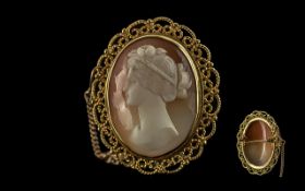 Ladies - Pleasing Quality 9ct Gold Open-worked Mounted Shell Cameo with Safety Chain, with full