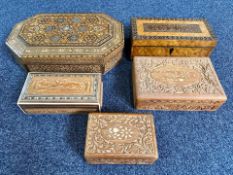 Five Wooden Boxes, profusely carved, assorted sizes, largest 15'' x 9''.