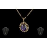 Antique period - fine 9ct gold amethyst and seed pearl set pendant with 9ct gold attached belcher